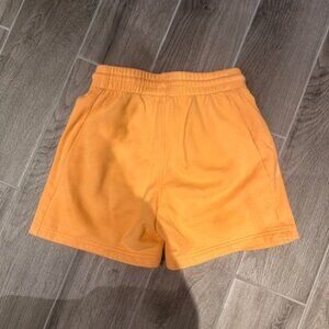 TNA orange shorts